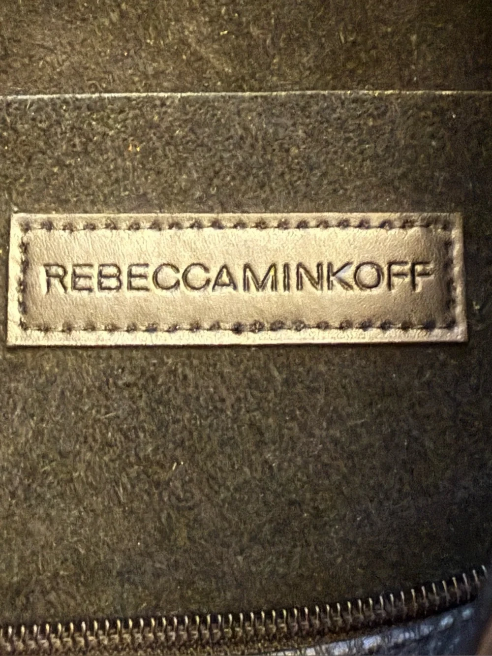 Rebecca Minkoff Unlined Convertible Hobo Bag in black pebbled leather.